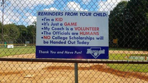 A youth baseball league in Tennessee erected a sign to remind parents to tone down their intensity level during games.