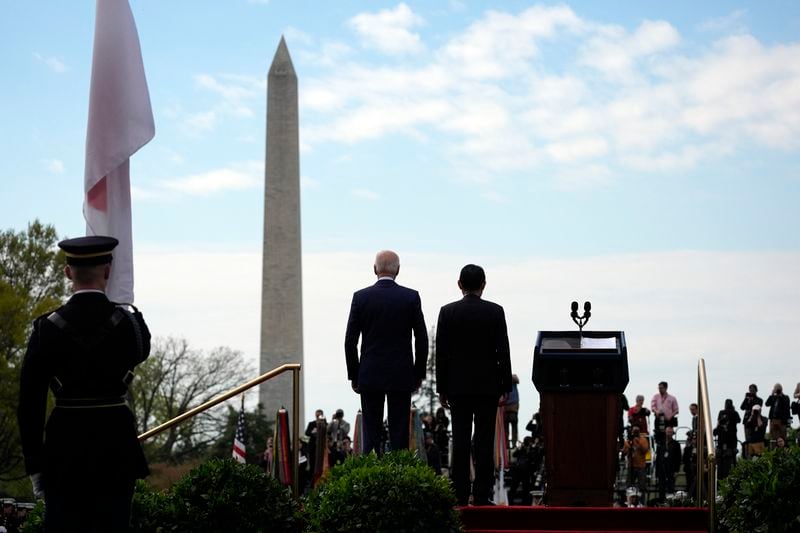 President Joe Biden and Japanese Prime Minister Fumio Kishida stand for the national anthems during a State Arrival Ceremony on the South Lawn of the White House, Wednesday, April 10, 2024, in Washington. (AP Photo/Evan Vucci)