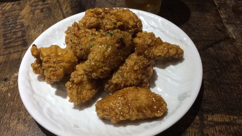 The curry tikkudak wings at Choong Man Chicken in Duluth. CONTRIBUTED BY WENDELL BROCK
