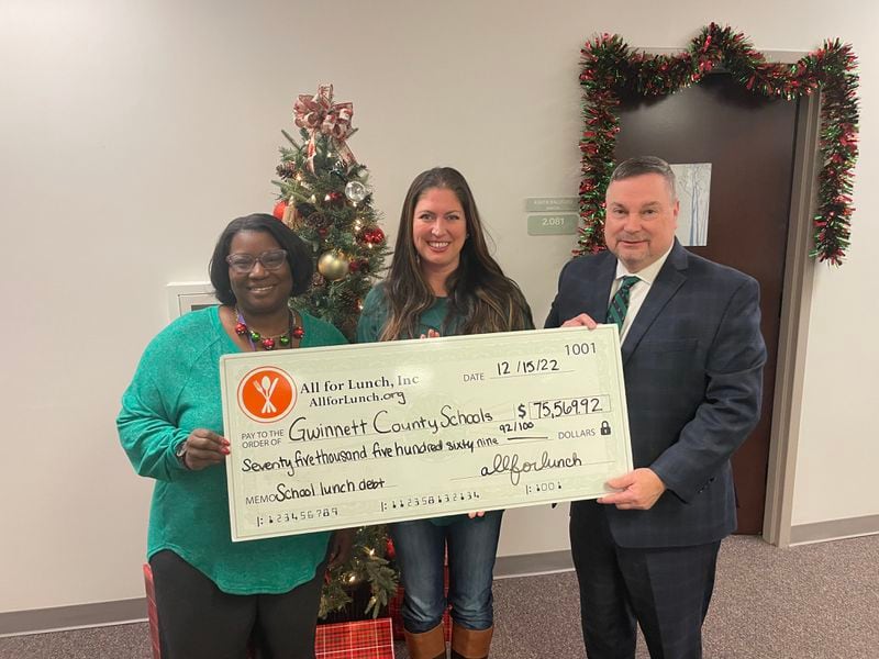 All for Lunch founder Alessandra Ferrara-Miller (center) provided more than $75,000 to pay for school lunch debts in Gwinnett County Public Schools. The donation cleared debts at all elementary schools in the county. (Courtesy of Alessandra Ferrara-Miller)