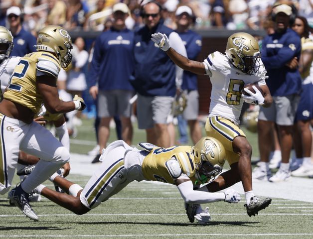 Georgia Tech wide receiver Malik Rutherford (8) extends a pass play as Georgia Tech Georgia Tech defensive back Khari Gee (23) defends during the Spring White and Gold game at Bobby Dodd Stadium at Hyundai Field In Atlanta on Saturday, April 13, 2024.   (Bob Andres for the Atlanta Journal Constitution)