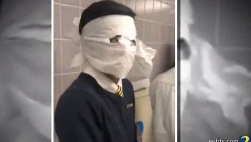 In the video, obtained by Channel 2 Action News, boys are shown wrapping toilet paper around their heads, cutting holes only for their eyes.