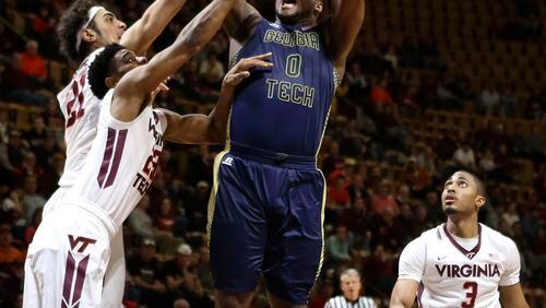 Georgia Tech's Charles Mitchell (0) shoots while being defended by Georgia Tech during first half action of the NCAA basketball game in Blacksburg, Va., Monday, Feb. 9 2015. (AP Photo / The Roanoke Times, Matt Gentry) LOCAL TELEVISION OUT; SALEM TIMES REGISTER OUT; FINCASTLE HERALD OUT; CHRISTIANBURG NEWS MESSENGER OUT; RADFORD NEWS JOURNAL OUT; ROANOKE STAR SENTINEL OUT Georgia Tech forward Charles Mitchell scored a team-high 17 points and didn't commit a turnover for the second game in a row. (ASSOCIATED PRESS)