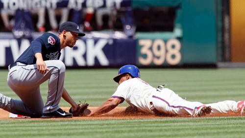 You don't see much action like this at baseball games. (AP Photo/Tom Mihalek)