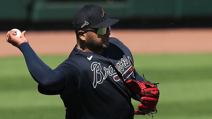 Atlanta Braves Pablo Sandoval works third base during the first full-squad workout Tuesday, Feb. 23, 2021, at CoolToday Park in North Port, Fla. (Curtis Compton / Curtis.Compton@ajc.com)
