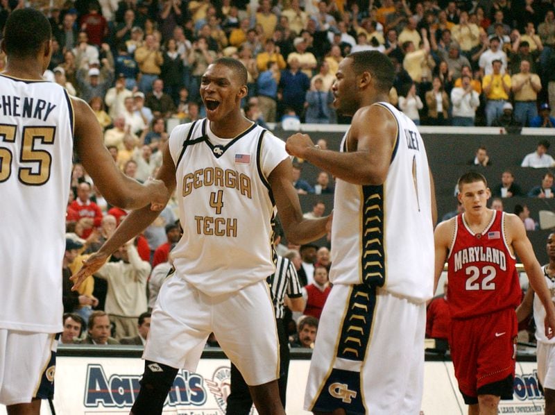 Georgia Tech's Chris Bosh (4) celebrates with teammates Anthony McHenry (55) and B.J. Elder (1) after a second-half play, with Maryland's Nik Caner-Medley (22) looking on, Sunday, Feb. 9, 2003, at the Alexander Memorial Coliseum in Atlanta. Georgia Tech won 90-84.  (Photo/Gregory Smith)