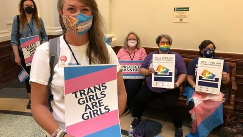 Linzy Foster, mother of a transgender girl, protests against Texas legislation that would bar her from youth sports. The Texas law went into effect this year, and Georgia legislators are considering such a law. (Molly Hennessy-Fiske/Los Angeles Times/TNS)