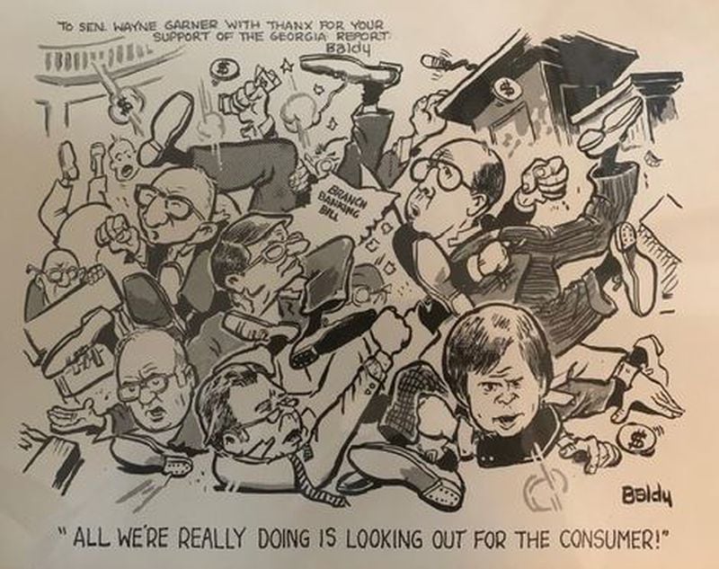 Wayne Garner’s autographed copy of an Atlanta Constitution editorial cartoon drawn by Cliff “Baldy” Baldowski, depicting one of the legislative clashes between community banks and larger ones. That’s Garner in the lower right-hand corner.