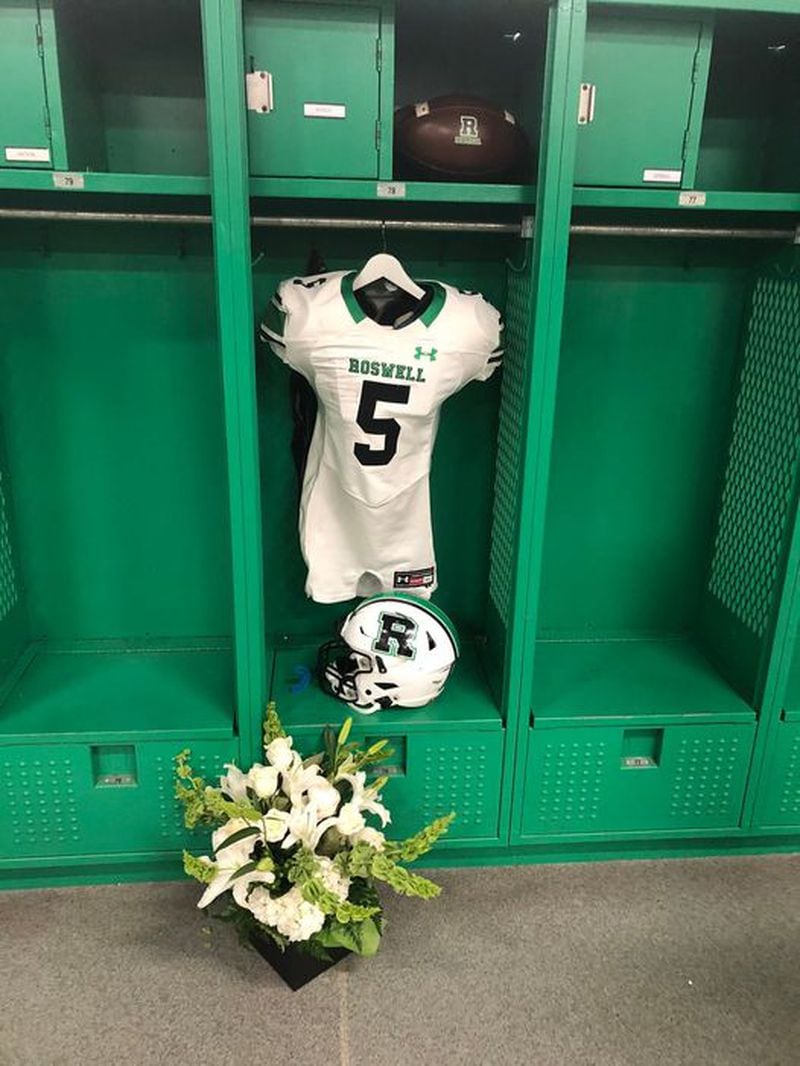 "Our Roswell community has suffered a heartbreaking loss. As many of you have heard, Roswell High School quarterback Robbie Roper passed away yesterday after complications from surgery. Robbie had a huge impact in our community and will be greatly missed by so many. Our thoughts and prayers are with the Roper family during this heartbreaking time," the city of Roswell posted on Facebook along with this image of the star quarterback's locker and uniform.