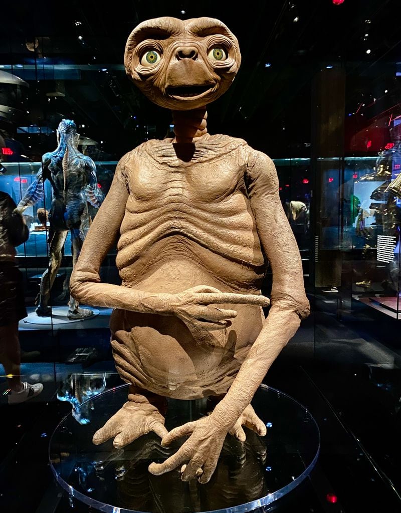 A full-body animatronic E.T. from director Steven Spielberg's collection is on display in the "Stories of Cinema" exhibit. (Suzanne Van Atten for The Atlanta Journal-Constitution)