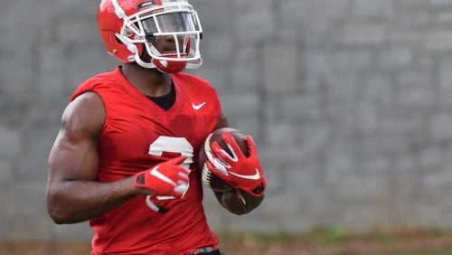 Georgia tailback Zamir White (3) appears to be living up to the tremendous hype surrounding him as he enters his redshirt freshman season with the Bulldogs.
