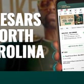 Caesars Sportsbook North Carolina app hand holding mobile phone