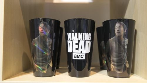 “The Walking Dead” fan gear is displayed at the Atlanta Movie Tour headquarters in the Castleberry Hills neighborhood in 2019. The writer of this Op-Ed says Georgia’s film tax credits are not nearly worth their considerable cost to the state. (Alyssa Pointer/alyssa.pointer@ajc.com)