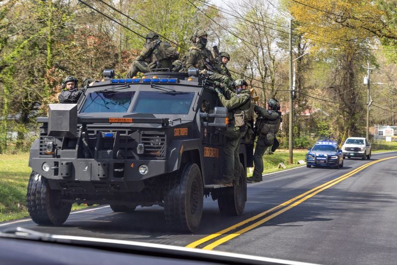 A Georgia State Trooper team drives near Intrenchment Creek Park in Atlanta on Monday, March 27, 2023. Agencies from across metro Atlanta, along with state agencies, were conducting a clearing operation of Intrenchment Creek Park led by DeKalb County Police. (i(Arvin Temkar / arvin.temkar@ajc.com)