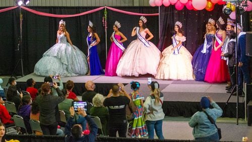Winners of the Miss International Grand Latina pageant model dresses at the Gwinnett County's annual Quince Girl Expo at Best friends Park Sunday, March 20, 2022  STEVE SCHAEFER FOR THE ATLANTA JOURNAL-CONSTITUTION