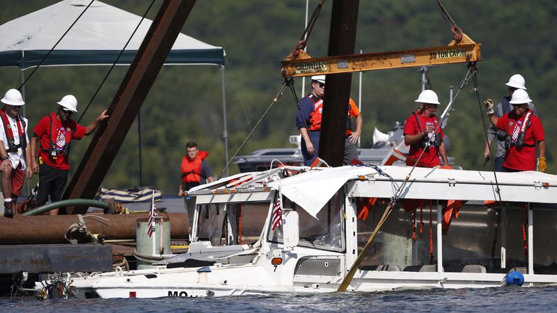 The duck boat that sank in Table Rock Lake in Branson, Mo., is raised Monday, July 23, 2018. The National Transportation Safety Board stated in its preliminary report that the weather turned deadly in a matter of minutes.