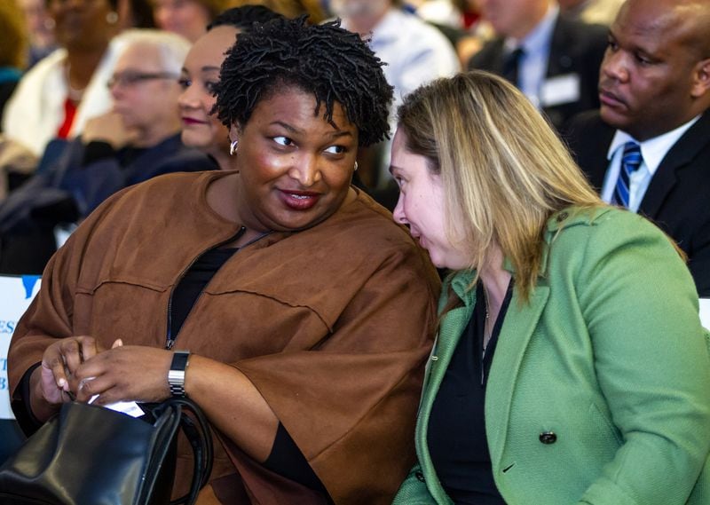 Stacey Abrams, left, talks with Sarah Riggs Amico, the former candidate for lieutenant governor, who is considering a run for the U.S. Senate. STEVE SCHAEFER / SPECIAL TO THE AJC