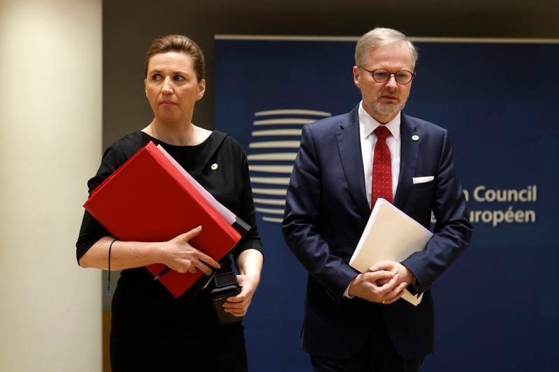 Denmark's Prime Minister Mette Frederiksen, left, and Czech Republic's Prime Minister Petr Fiala arrive for a round table meeting at an EU summit in Brussels, Thursday, April 18, 2024. European Union leaders vowed on Wednesday to ramp up sanctions against Iran as concern grows that Tehran's unprecedented attack on Israel could fuel a wider war in the Middle East. (AP Photo/Omar Havana)