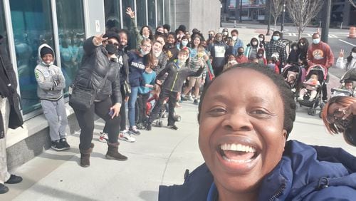 Educator Andrea Hall escorts her group EPIC Homeschool Network on a field trip to the Georgia Aquarium. In a guest column, Hall talks about the surge in Black parents choosing to home-school their children in the wake of the pandemic. (Courtesy photo)