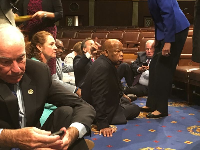 In 2016, Rep. John Lewis led another sit-in in an unlikely place — the floor of the U.S. House of Representatives. The day-long protest was launched by a handful of Democrats trying to force a vote on gun control measures. Eventually 170 lawmakers participated in the protest. House Speaker Paul Ryan, who called the effort a publicity stunt, chose not to have the lawmakers forcibly removed or arrested. (Rep. John Yarmuth via AP)