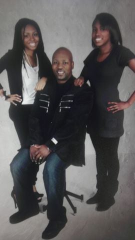 Albert Scott and his daughters Porshae' and Chanel