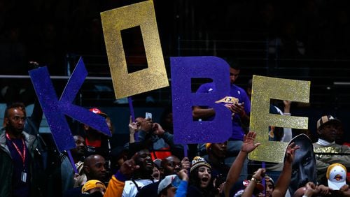 ATLANTA, GA - NOVEMBER 18: Fans hold up signs for Kobe Bryant #24 of the Los Angeles Lakers during the game between the Lakers and the Atlanta Hawks at Philips Arena on November 18, 2014 in Atlanta, Georgia. NOTE TO USER: User expressly acknowledges and agrees that, by downloading and or using this photograph, User is consenting to the terms and conditions of the Getty Images License Agreement. (Photo by Kevin C. Cox/Getty Images)