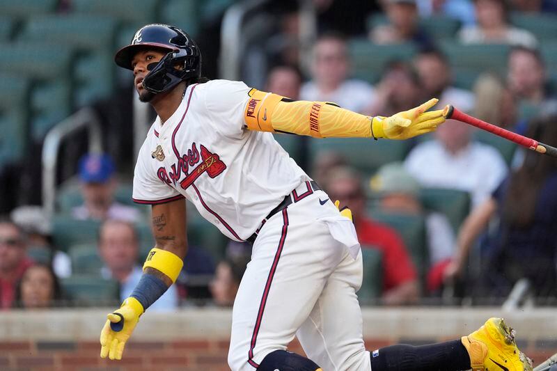 Atlanta Braves' Ronald Acuña Jr. runs to first base after hitting q single in the first inning of a baseball game against the Boston Red Sox Tuesday, May 7, 2024, in Atlanta. (AP Photo/John Bazemore)