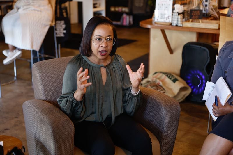 Sybil Vaughn, co-owner of The Circuit Salon, speaks during a roundtable discussion to discuss the Fani Willis hearing with local Black women at Black Coffee in Atlanta on Thursday, March 7, 2024. (Natrice Miller/ Natrice.miller@ajc.com)