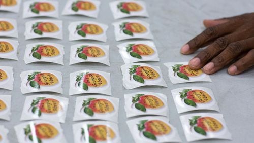 Georgia voting stickers. FILE PHOTO