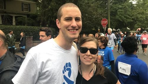 Tawny Mack with her husband, Zack Howard, before the start of Saturday’s Undy Run held annually to raise awareness about colorectal cancer. CONTRIBUTED