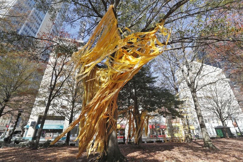 A ribbon sculpture by Sara Jimenez is among the artworks on display in an installation entitled "PRISM: Winter Lights at Woodruff Park." Bob Andres / bandres@ajc.com