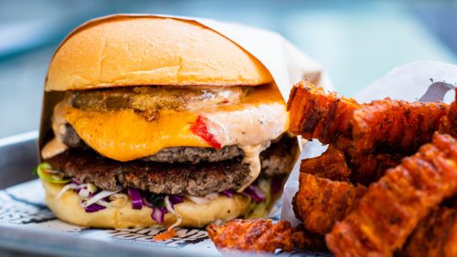 Grindhouse Killer Burgers sells the Impossible Burger at five locations. This shows the Dixie Style burger at Grindhouse on Memorial Drive. CONTRIBUTED BY HENRI HOLLIS