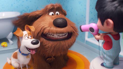 Max the terrier (voice of Patton Oswalt), left, and Duke the mutt (Eric Stonestreet) must get used to a toddler in the family in “The Secret Life of Pets 2.” Illumination Entertainment/Universal Pictures