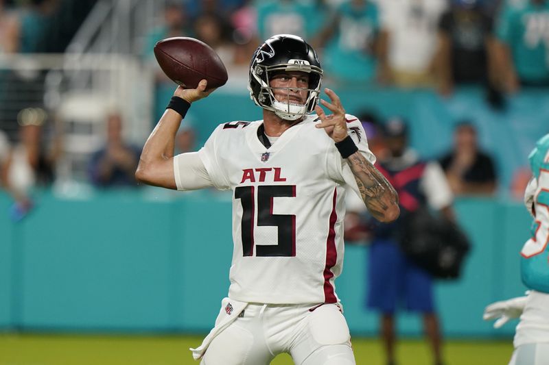 Atlanta Falcons quarterback Feleipe Franks (15) looks to pass the ball during the first half of a NFL preseason football game against the Miami Dolphins, Saturday, Aug. 21, 2021, in Miami Gardens, Fla. Franks took over for quarterback AJ McCarron who was injured on a play. (AP Photo/Wilfredo Lee)