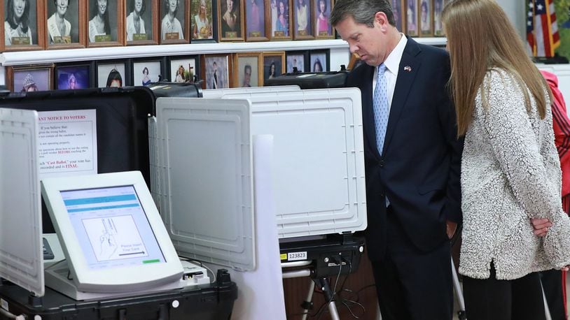 Nov 6, 2018 Winterville: Secretary of State Brian Kemp, Republican candidate for Georgia governor, with his daughter Amy Porter, casts his vote at the Winterville Train Depot on Tuesday, Nov. 6, 2018, in Winterville. Curtis Compton/ccompton@ajc.com