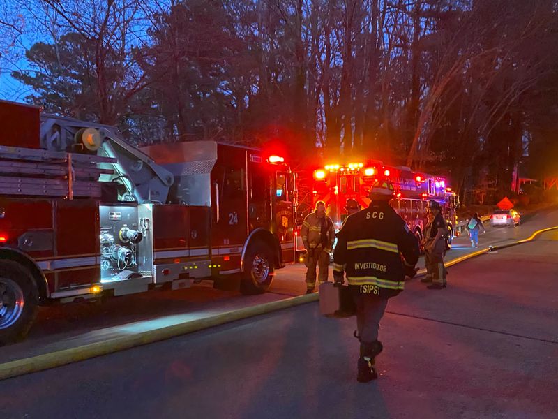 A fire broke out at the Dunwoody Village Apartment Homes on Monday, leaving at least two residents with burns, authorities said. Credit: ASIA SIMONE BURNS / ASIA.BURNS@AJC.COM