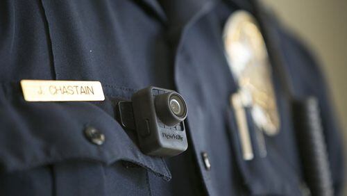 A federal grant will help the Woodstock Police Department implement a body-worn camera program for its officers. PHIL SKINNER / AJC FILE