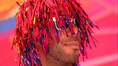 Christian Goodlette sports pride hair during the Pure Heat Community Festival, part of Black Pride Weekend at Piedmont Park. Curtis Compton /ccompton@ajc.com