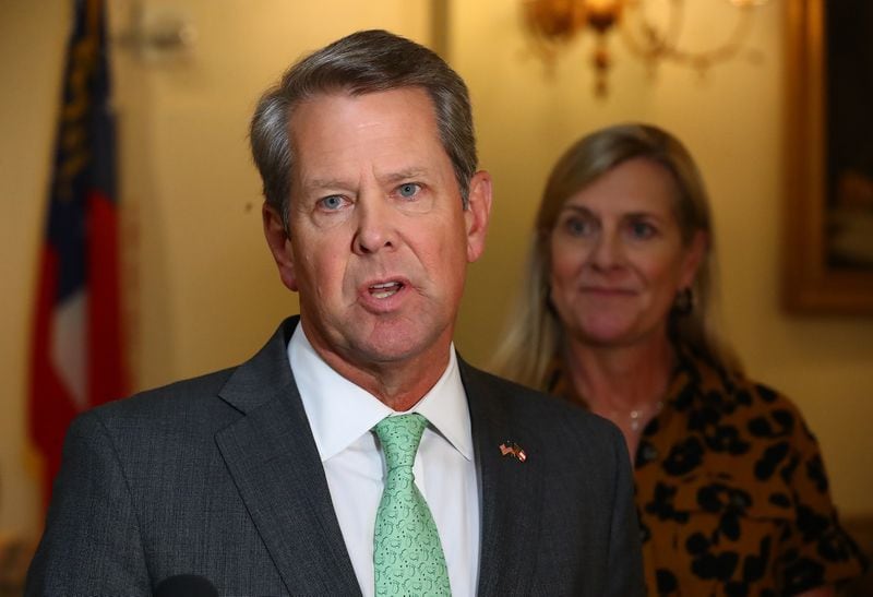 081022 Atlanta: Governor Brian P. Kemp, with First Lady Marty Kemp, takes questions from the media following a special economic development announcement on Wednesday, August 10, 2022, in Atlanta.   “Curtis Compton / Curtis Compton@ajc.com