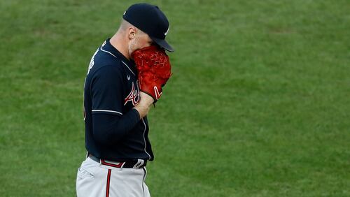 Atlanta Braves' Sean Newcomb reacts after hitting Philadelphia Phillies' Bryce Harper with a pitch during the second inning of a baseball game, Monday, Aug. 10, 2020, in Philadelphia. (AP Photo/Matt Slocum)