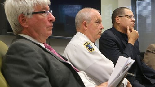 Judge Brad Boyd (from left), Police Chief Gary Stiles, and Fulton County Chairman John Eaves listen to discussion at a community meeting Tuesday about crime in South Fulton. Curtis Compton/ccompton@ajc.com AJC File Photo