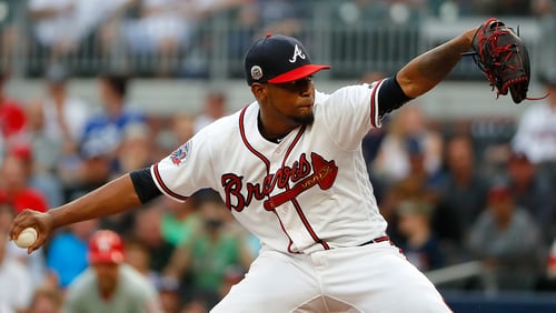 ATLANTA, GA - AUGUST 08: Julio Teheran #49 of the Atlanta Braves pitches in the first inning against the Philadelphia Phillies at SunTrust Park on August 8, 2017 in Atlanta, Georgia. (Photo by Kevin C. Cox/Getty Images)