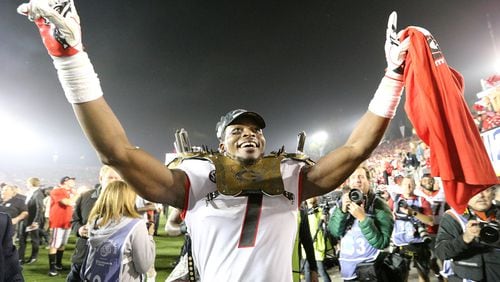 Georgia linebacker Lorenzo Carter celebrates beating Oklahoma in the College Football Playoff semifinal in the Rose Bowl on Monday.