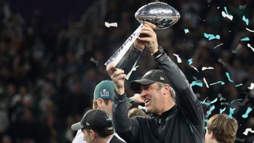 Head coach Doug Pederson of the Philadelphia Eagles celebrates with the Vince Lombardi Trophy after his teams 41-33 win over the New England Patriots in Super Bowl LII at U.S. Bank Stadium on February 4, 2018 in Minneapolis, Minnesota. The Philadelphia Eagles defeated the New England Patriots 41-33.  (Photo by Rob Carr/Getty Images)