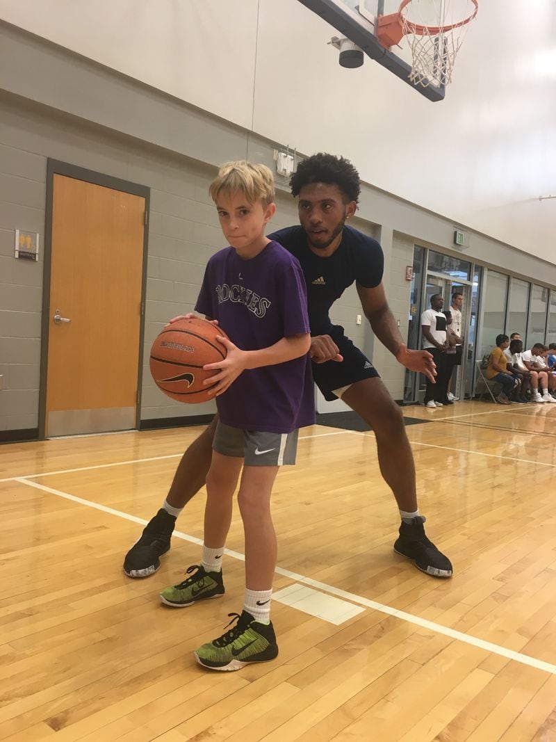 James Banks poses for a photo with Hunter Sheheane at a Georgia Tech basketball camp this past summer. (Courtesy Gabe Sheheane)