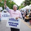 During an Atlanta festival parade in late April, Georgia Supreme Court candidate John Barrow donned a pink t-shirt emblazoned with the words “Empowering Women” and carried a “Vote For Choice” campaign sign. He doubled down on his abortion rights message a few days later during an Atlanta Press Club candidate debate, when he criticized his opponent, Justice Andrew Pinson, for defending Georgia’s anti-abortion law. (Elijah Nouvelage for The Atlanta Journal-Constitution)