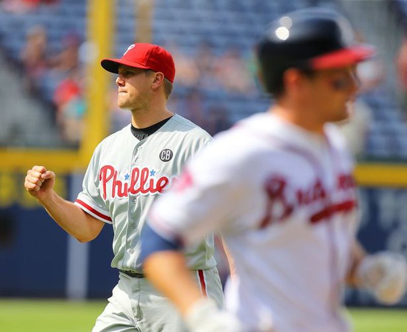 Jonathan Papelbon celebrates after Phil Gosselin lined out to first base for the final out in the Phillies' four-pitcher no-hitter against the Braves on Monday.