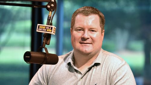 Erick Erickson at a studio mic at News 95.5 and AM750 WSB. He’s also the editor-in-chief of RedState.Com and will host next weekend’s gathering of GOP presidential candidates. Hyosub Shin, hshin@ajc.com