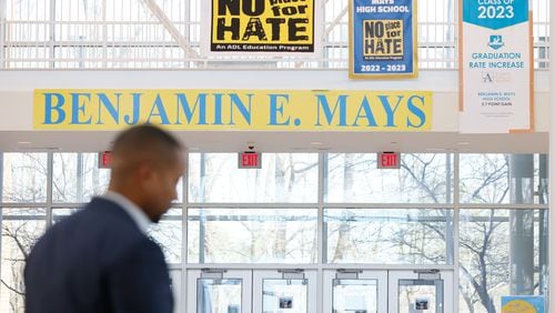 “No place for hate” signs are seen by the lobby of Benjamin E. Mays School. Four students suffered non-life-threatening injuries in a shooting in February, but the school received good news recently when popular restaurateur Pinky Cole Hayes announced she's helping to pay for the prom and Morris Brown College said it is offering admission to eligible students. (Miguel Martinez /miguel.martinezjimenez@ajc.com)