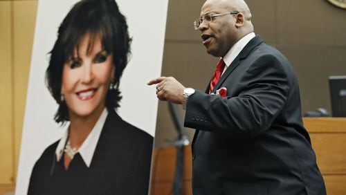 4/17/18 - Atlanta - Chief Assistant District Attorney Clint Rucker, with a photo of Diane McIver behind him, makes closing arguments for the prosecution today during the Tex McIver murder trial at the Fulton County Courthouse. Bob Andres bandres@ajc.com